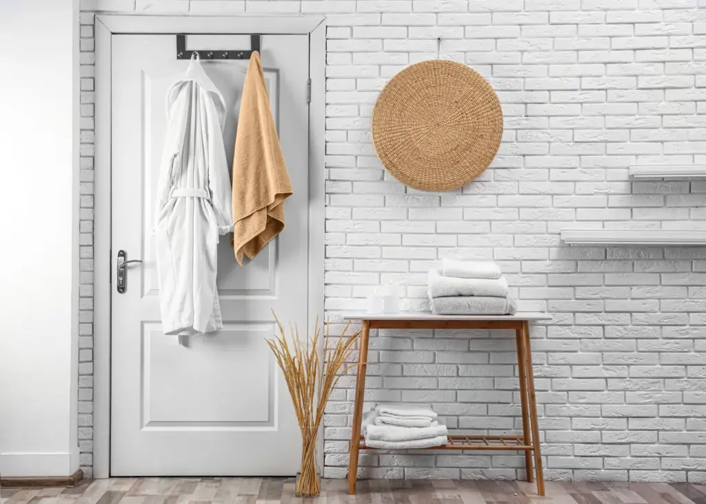 Bathrobes hanging on a bathroom door